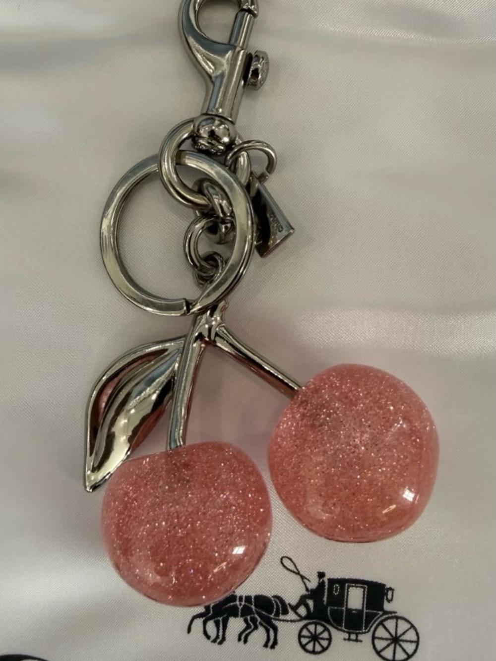 EUC Coach Pink Cherry Keychain featuring Silver Hardware